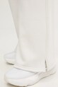 Under Armour spodnie dresowe Icon Vida 6004853 beżowy