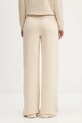 Ρούχα Παντελόνι φόρμας Guess Jeans W5BB04.KC811 μπεζ