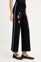 Never Fully Dressed spodnie dresowe czarny NFDKN727