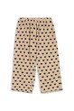 Konges Sløjd spodnie dziecięce z bawełną CHLEO PANTS GOTS wzorzyste beżowy KS103752.9BYA