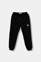 Дитячі бавовняні штани Calvin Klein Jeans аплікація чорний IU0IU00713.128.170.9BYA