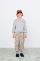 Tinycottons pantaloni tuta in cotone bambino/a DOGS SWEATPANT sovrastampa grigio AW25.068