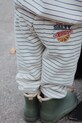 Konges Sløjd spodnie dresowe dziecięce AMIO SWEAT PANTS OCS dzianina beżowy KS103670.9BYA