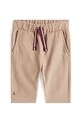 Дитячі бавовняні штанці Tommy Hilfiger бавовна бежевий KN0KN02053.9BYA