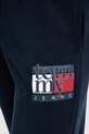Bombažen spodnji del trenirke Tommy Jeans mornarsko modra DM0DM22094