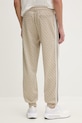 Odzież Guess spodnie dresowe PRIMO Z5BB19.K2042 beżowy