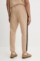 Odzież adidas spodnie dresowe Essentials JX0712 beżowy