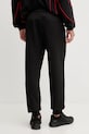 Îmbrăcăminte Puma pantaloni de trening x F1 630123 negru