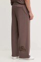 Odjeća Donji dio trenirke Puma x RIPNDIP 632416 smeđa