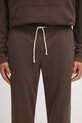 New Balance spodnie dresowe bawełniane MADE IN USA brązowy MP43547RHE