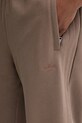 adidas Originals spodnie dresowe bawełniane Ess Wide Pt brązowy JW1046
