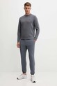 Under Armour spodnie dresowe Vibe Woven 1386557 szary AW25