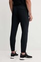 Odzież Under Armour spodnie dresowe Vibe Woven 1386557 czarny