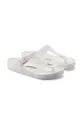 white Birkenstock flip flops