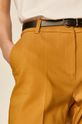 musztardowy Spodnie damskie z kantem żółte