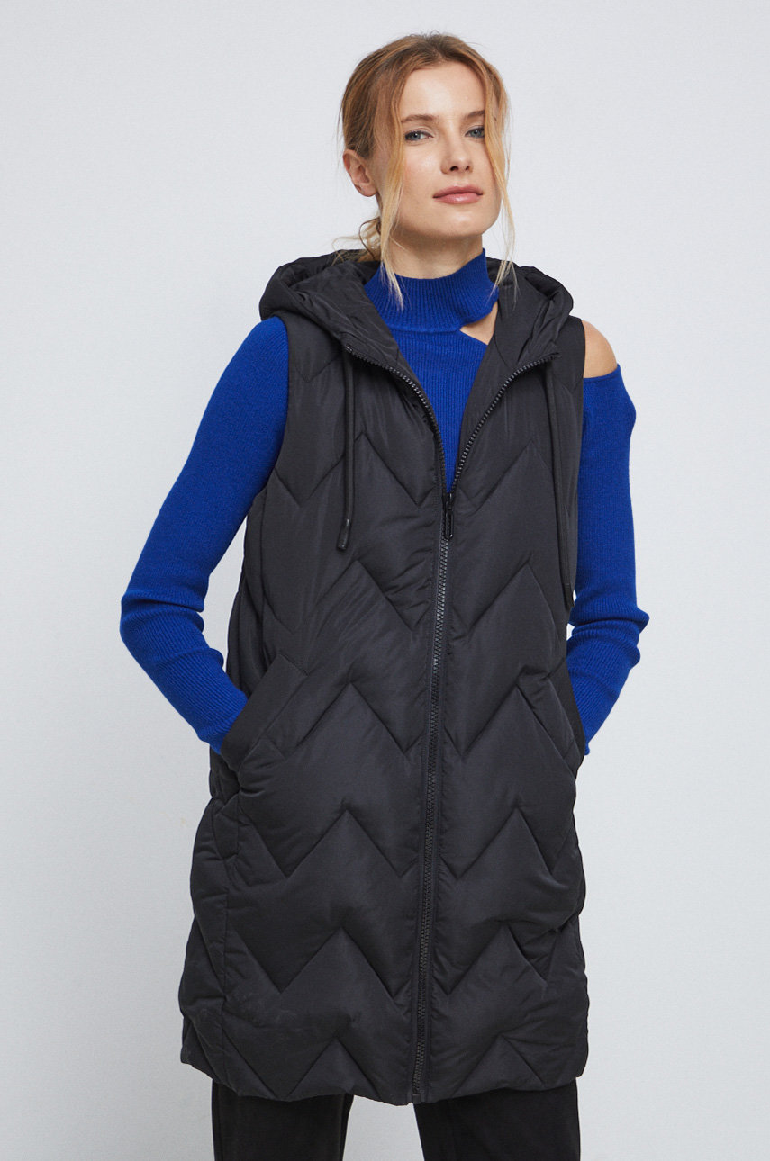 Vesta dámska čierna farba  Základná látka: 100 % Polyester Podšívka: 100 % Polyester Výplň: 100 % Polyester