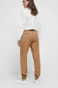 Spodnie damskie gładkie kolor beżowy Materiał zasadniczy: 100 % Lyocell, Inne materiały: 100 % Bawełna