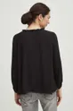 Bluzka damska z asymetrycznym dołem kolor czarny 100 % Wiskoza