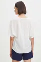 Bluzka damska gładka z ozdobnym elementem kolor biały 100 % Wiskoza