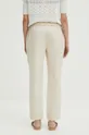 Kalhoty dámské béžová barva <p>98 % Bavlna, 2 % Elastan</p>
