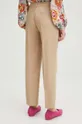 Kalhoty dámské regular jednobarevné béžová barva <p>Hlavní materiál: 78 % Polyester, 18 % Viskóza, 4 % Elastan Podšívka: 100 % Polyester</p>