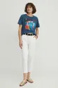 Bavlněné tričko dámské z kolekce Graphics Series tyrkysová barva <p>100 % Bavlna</p>
