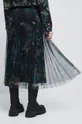 Sukňa dámska so vzorom čierna farba  Základná látka: 100% Polyester Podšívka: 95% Polyester, 5% Elastan