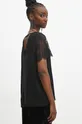 Bluzka damska z koronkowymi wstawkami kolor czarny Materiał główny: 100 % Wiskoza Materiał dodatkowy: 100 % Nylon 