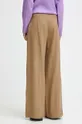Kalhoty dámské jednobarevné béžová barva <p>85 % Viskóza, 15 % Polyester</p>