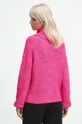 Sweter damski z fakturą kolor różowy <p>50 % Recyklowany poliester, 45 % Wiskoza, 5 % Poliamid</p>