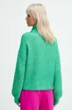 Sweter damski z fakturą kolor zielony <p>50 % Recyklowany poliester, 45 % Wiskoza, 5 % Poliamid</p>