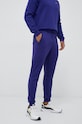 Under Armour spodnie dresowe dzianina fioletowy 1290261