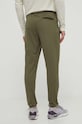 Odzież Under Armour spodnie dresowe 1290261 zielony