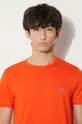 oranžová Bavlnené tričko Lacoste