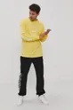 Bavlnené tričko s dlhým rukávom HUF žltá