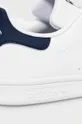 white adidas Originals shoes