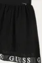 Guess - Dievčenská sukňa 98-122 cm  Podšívka: 95% Bavlna, 5% Elastan Základná látka: 4% Elastan, 96% Polyester