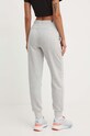 Odzież Puma spodnie dresowe 586842 szary