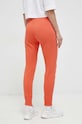 Odzież Under Armour spodnie 1356416 pomarańczowy
