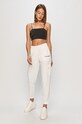 Champion - Spodnie 112659 112659 biały SS21