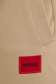 HUGO spodnie dresowe bawełniane Doak212 beżowy 50447963