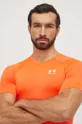 Kratka majica za vadbo Under Armour oranžna