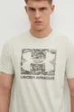 beige Under Armour t-shirt