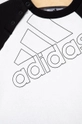 Otroška trenirka adidas  Glavni material: 70 % Bombaž, 30 % Recikliran poliester Patent: 95 % Bombaž, 5 % Elastan