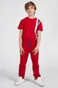 червоний Guess - Дитячі бавовняні штани Для хлопчиків