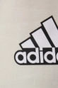 bež Bombažne hlače adidas