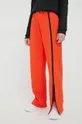 Παντελόνι φόρμας adidas by Stella McCartney πορτοκαλί