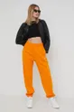 Παντελόνι φόρμας adidas Originals Adicolor πορτοκαλί