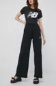 New Balance spodnie WP21502BK czarny