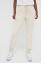 pszeniczny New Balance spodnie dresowe WP21508CTU Damski